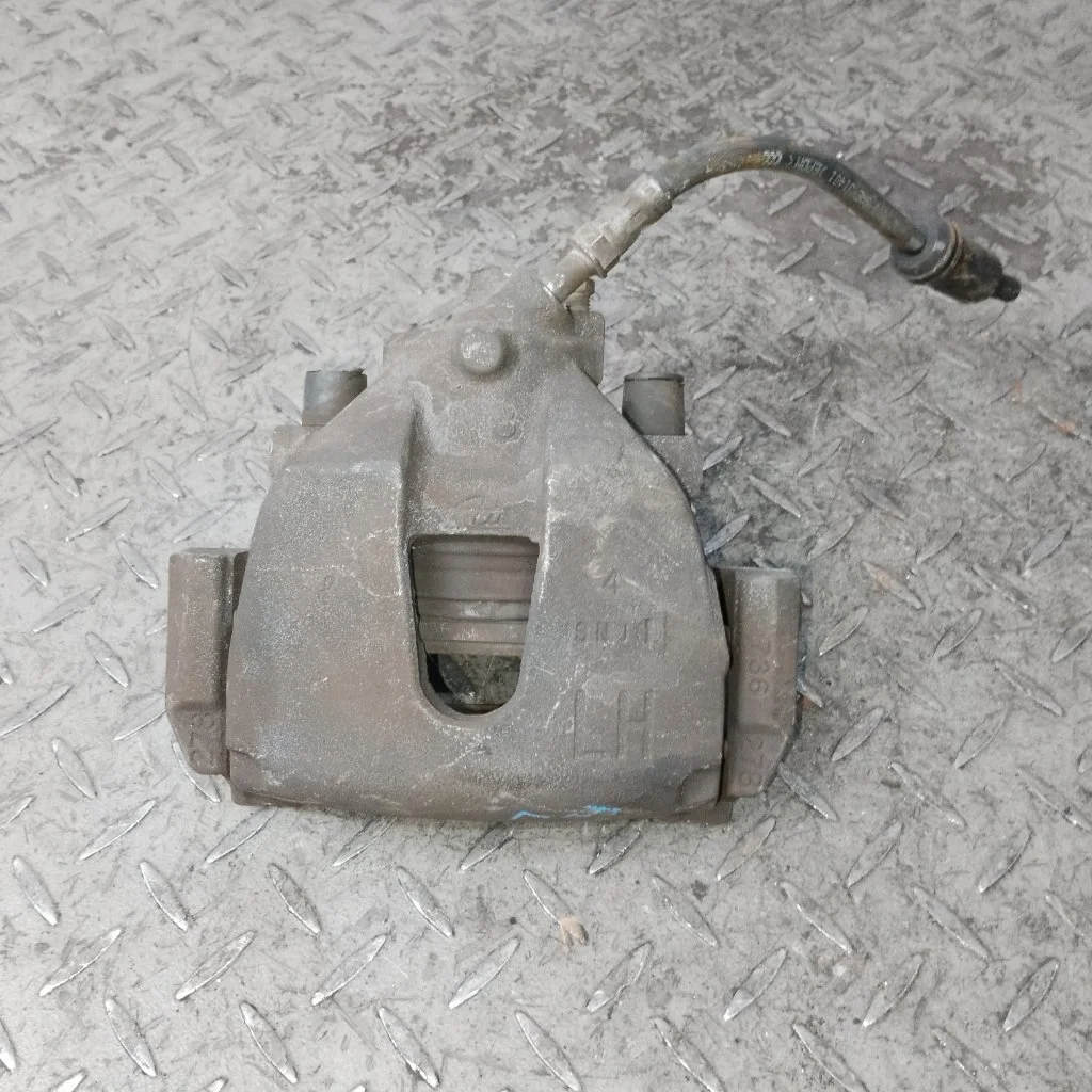 Суппорт тормозной Ford Focus 1682876 2, передний левый