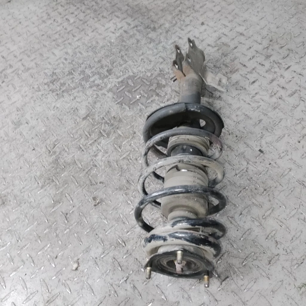 Стойка амортизатора в сборе Nissan Almera 54303BM419 N16, передняя левая