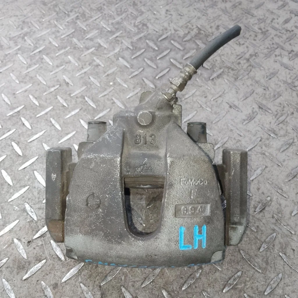 Суппорт тормозной Ford C-Max 1682876 1, передний левый