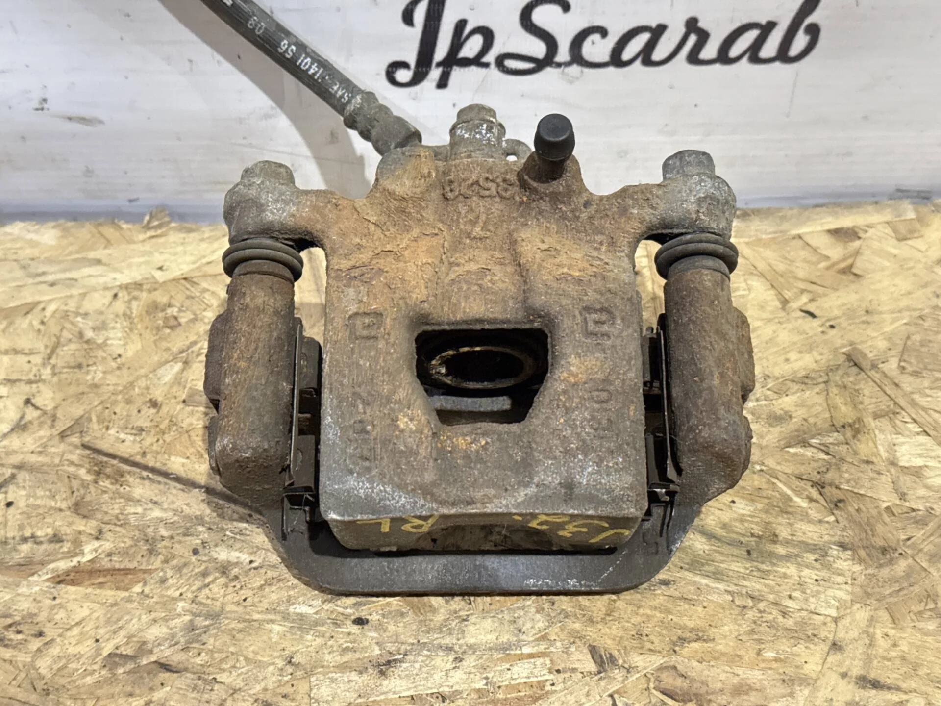 Суппорт задний левый Nissan Teana J32