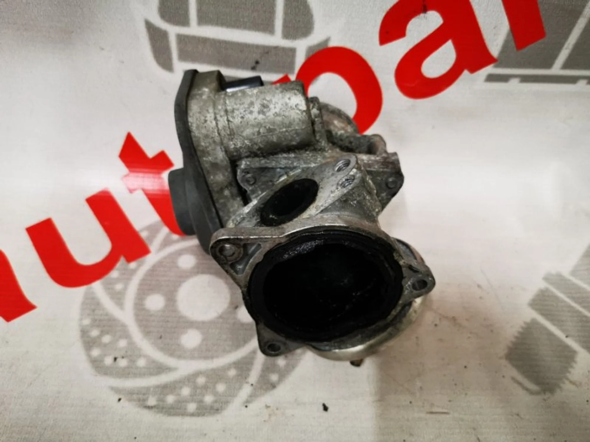 Дроссельная заслонка Skoda Octavia 038128063G