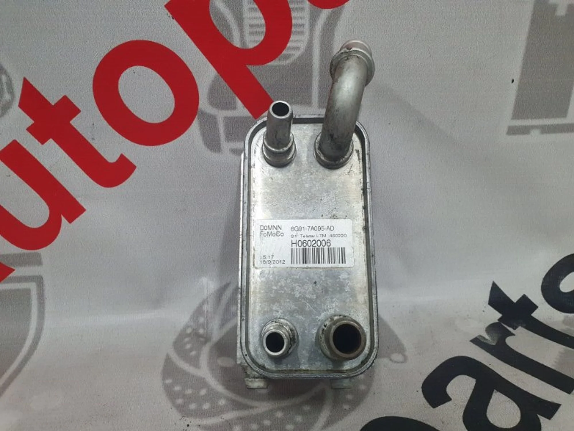 Маслоохладитель Ford Focus 3 6G917A095AD