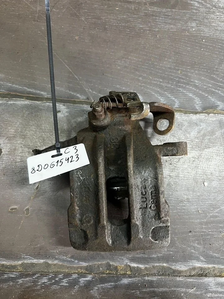 Суппорт тормозной задний левый vag 8d0615423