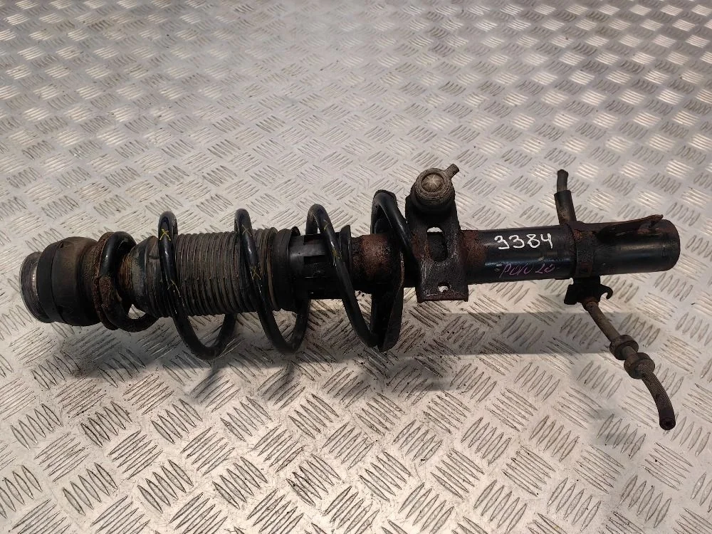 Стойка амортизатора передняя VW Polo