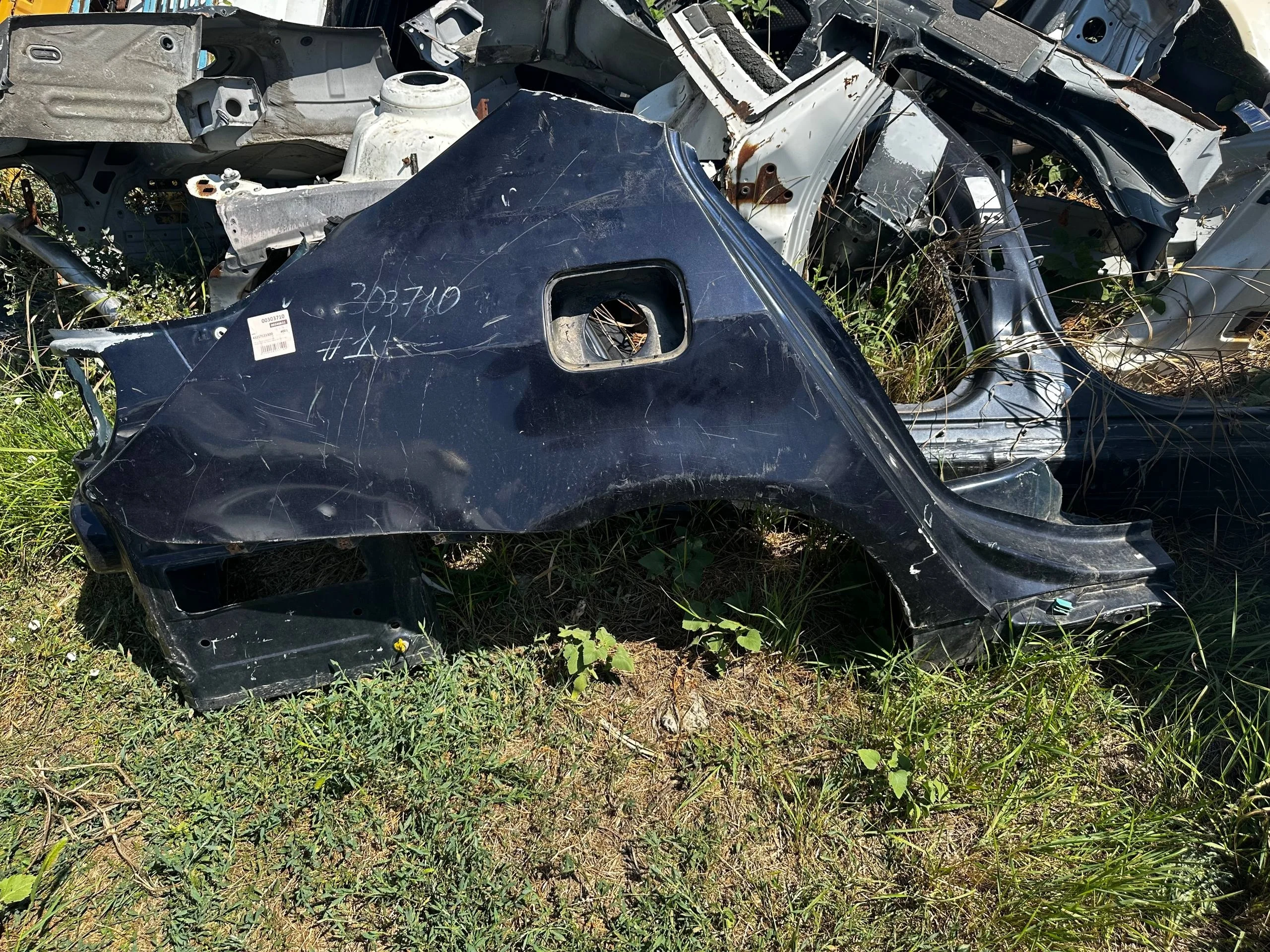 [Б/У] Крыло заднее правое BMW E60 - шпаклёвано, в сборе с частью под фонарь 41217111263 [Незначительные дефекты] [Код: 00346831 ]
