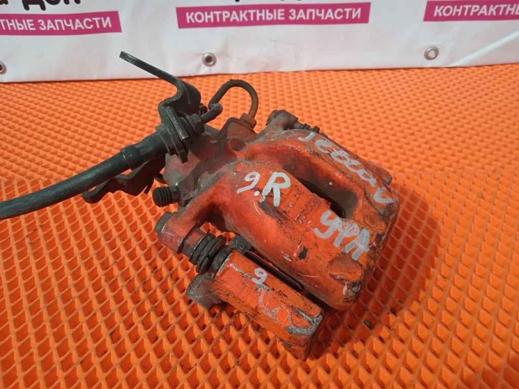 Суппорт тормозной Volkswagen Jetta 2008 5