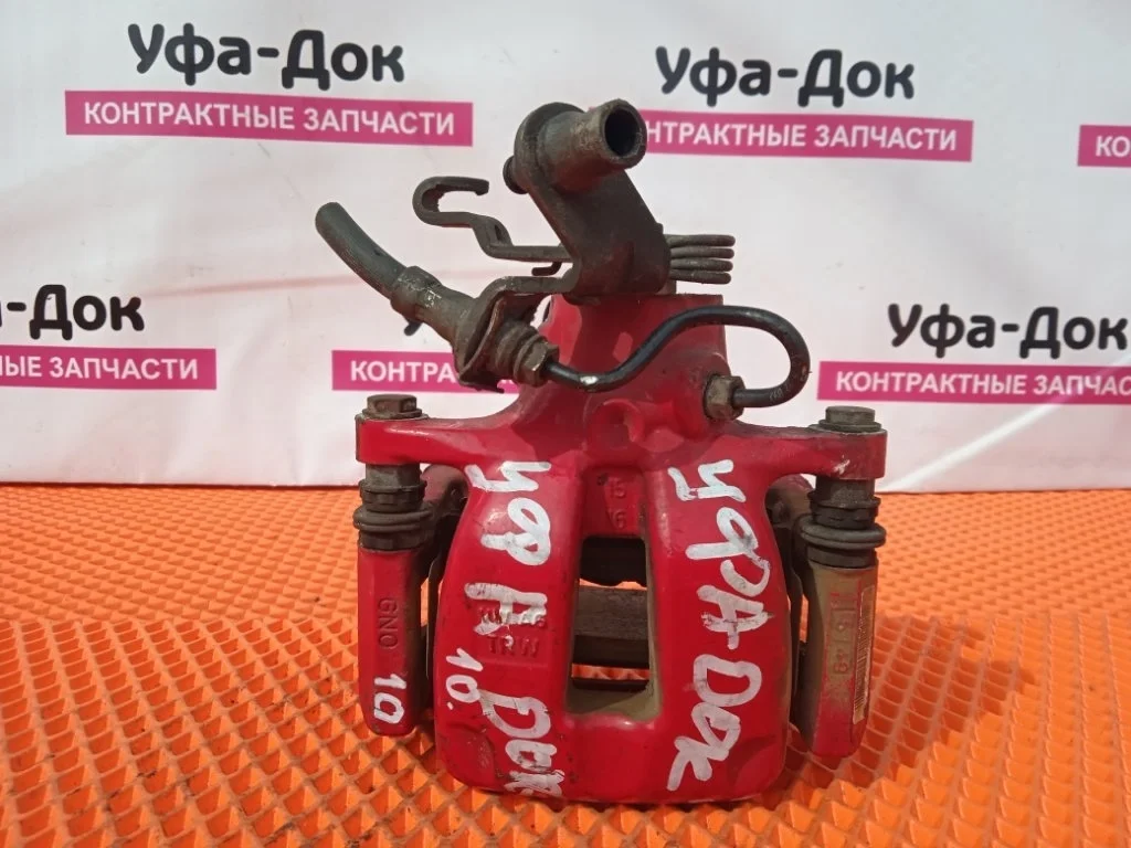 Суппорт тормозной Volkswagen Jetta 2008 5