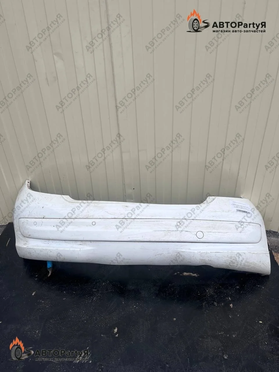 Бампер задний Peugeot 207