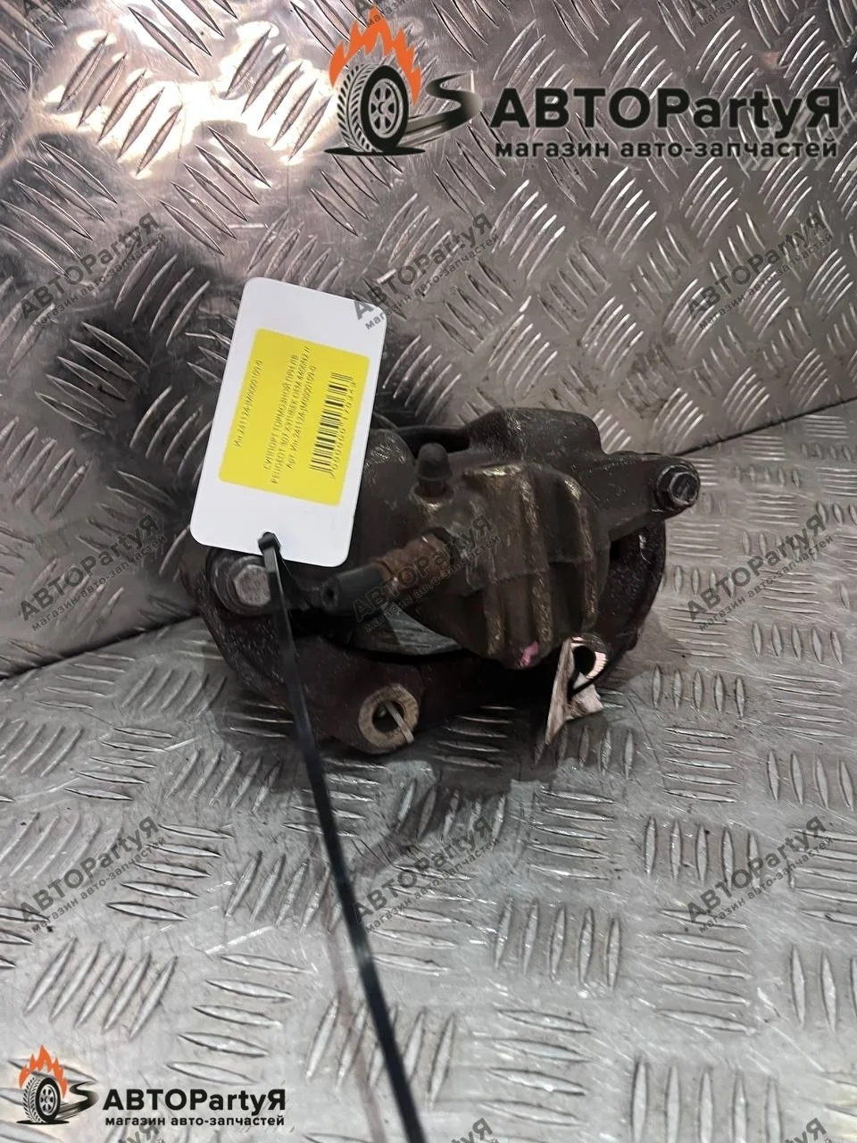 Суппорт тормозной передний левый Peugeot (Пежо)  307