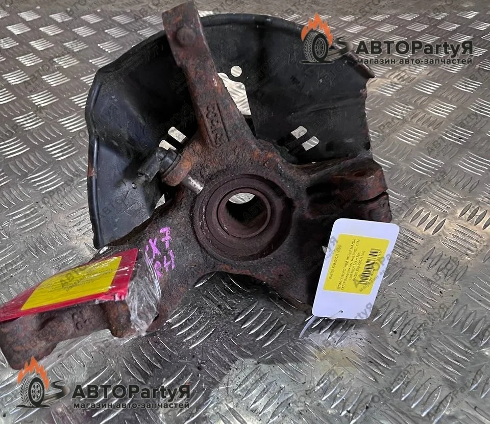 Кулак поворотный правый Mazda CX7 ER L3-VDT