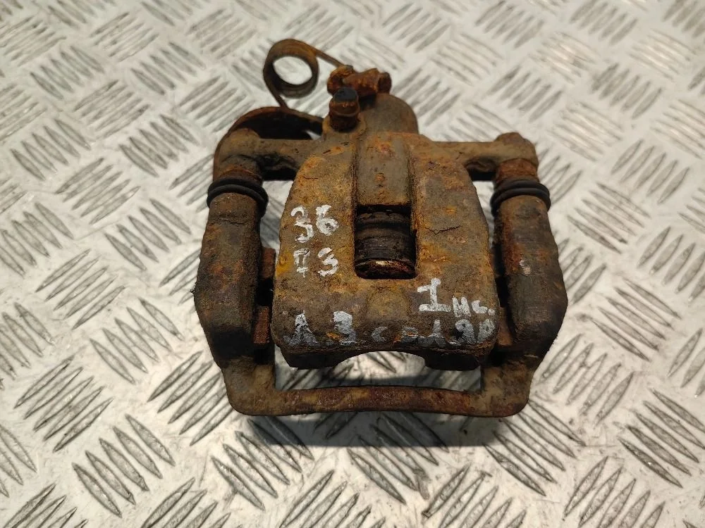 Суппорт тормозной задний левый Hyundai Solaris