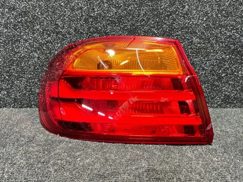 Фонарь Bmw 63217296097, задний левый