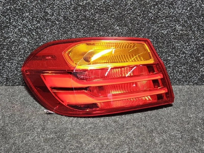 Фонарь Bmw 63217296097, задний левый