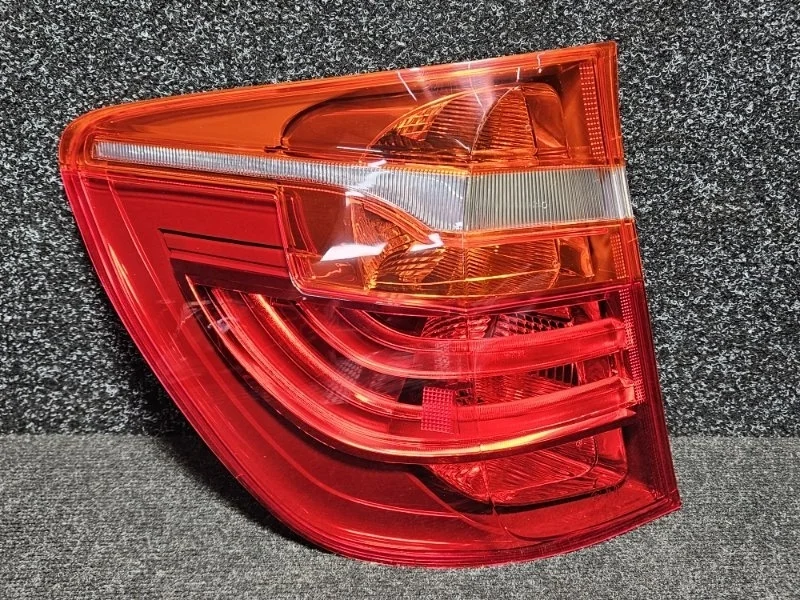 Фонарь Bmw 63217217311, задний левый