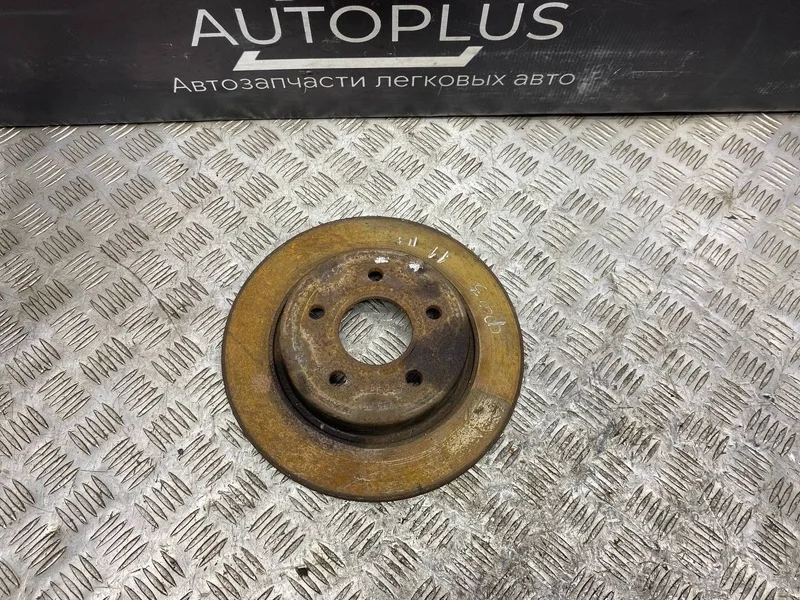 Диск тормозной Ford Focus 1704765 ХЭТЧБЕК 1.6 IQDA, задний