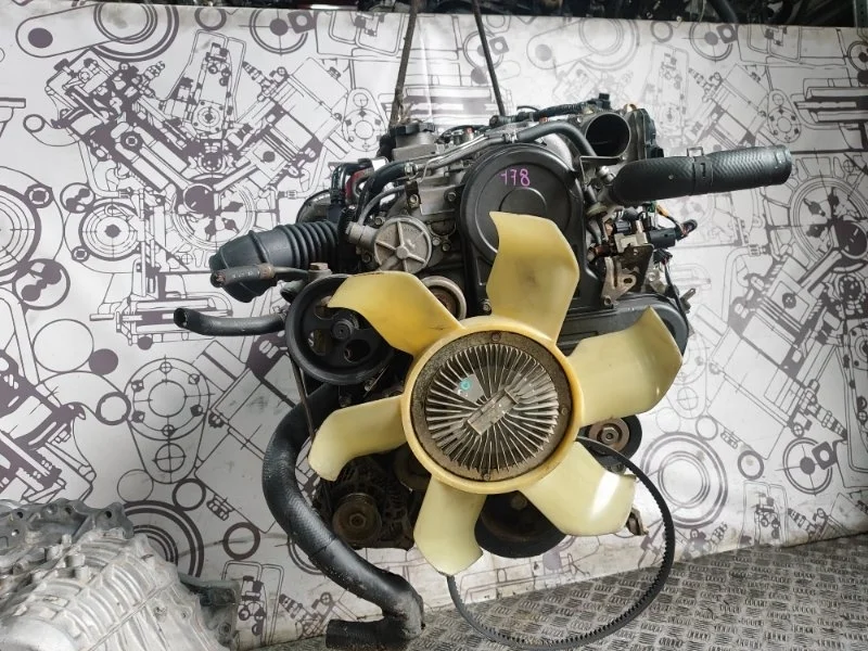 Двигатель Mitsubishi L200 Pajero Sport 1000C753 4D56U