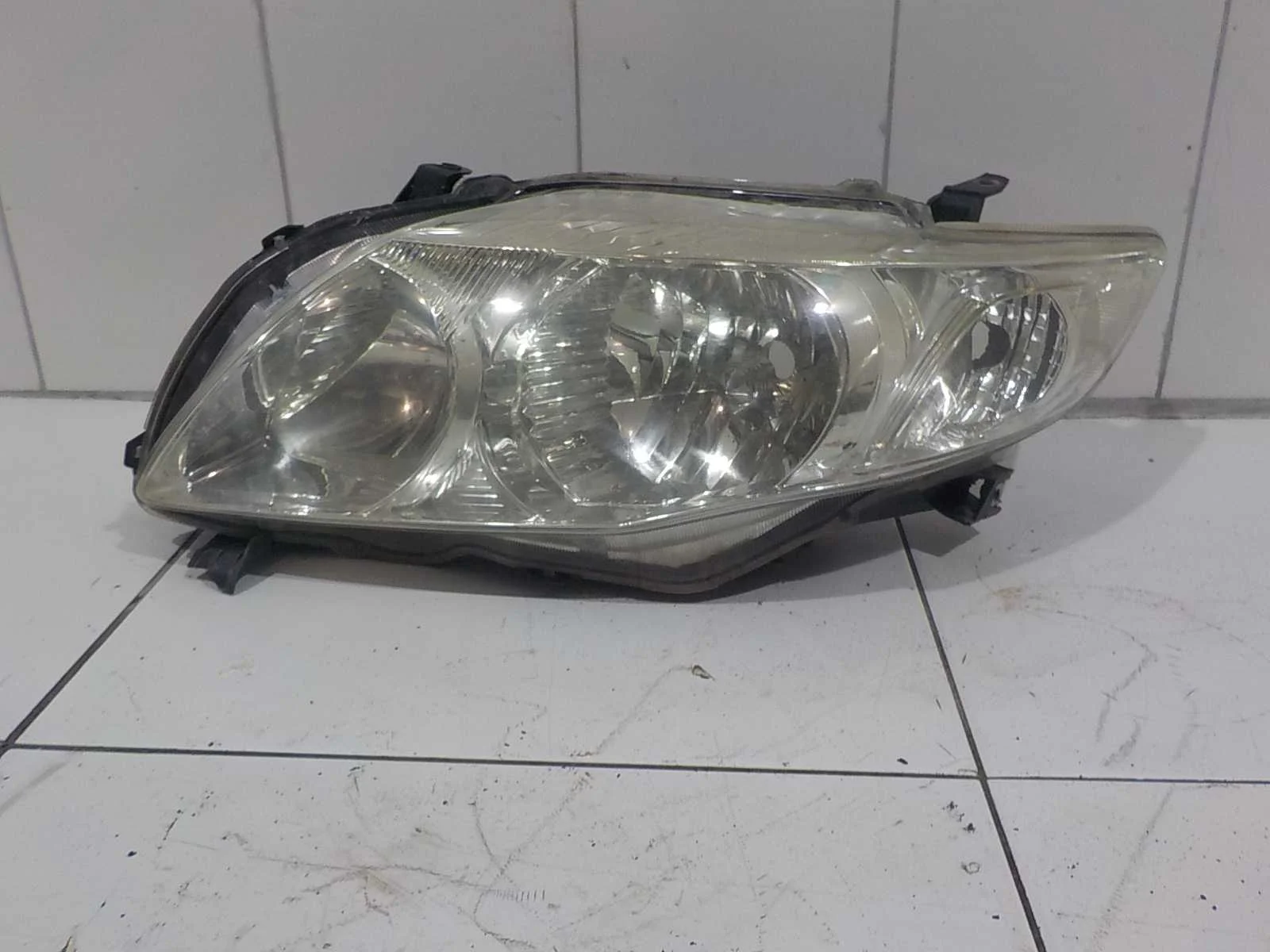 фара TOYOTA COROLLA 150