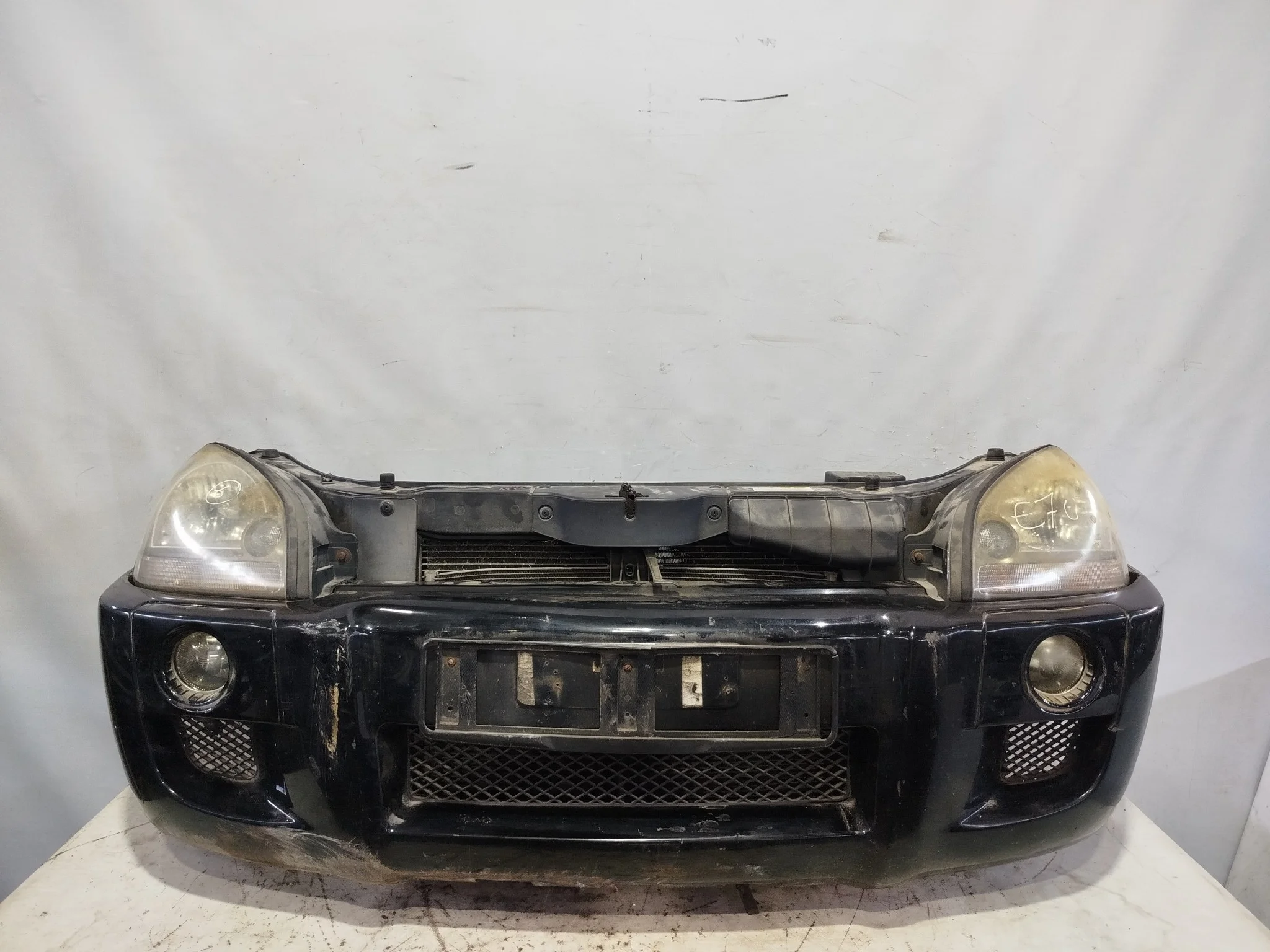 NOSECUT HYUNDAI TUCSON JM 865112E040 черный DY515