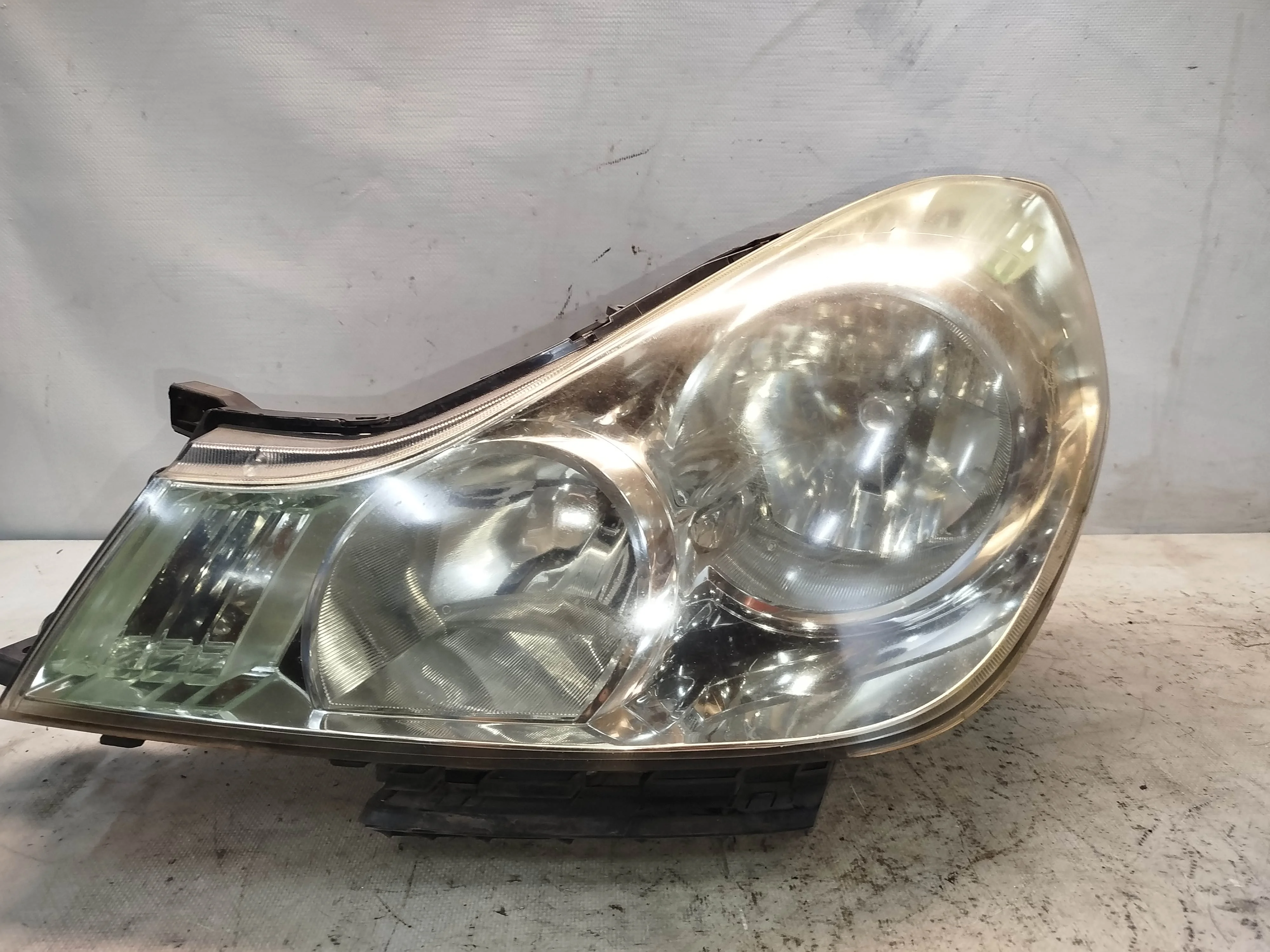 ФАРА NISSAN WINGROAD JY12 NY12 Y12 1777 ГАЛОГЕН КОРРЕКТОР ФАР ЛЕВАЯ 26060CV00A NA7171Z
