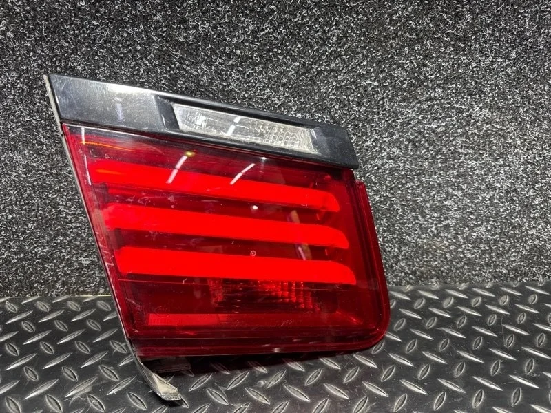 Фонарь в крышку багажника Bmw 7 2011 63217300271 F02 N63B44A, левый