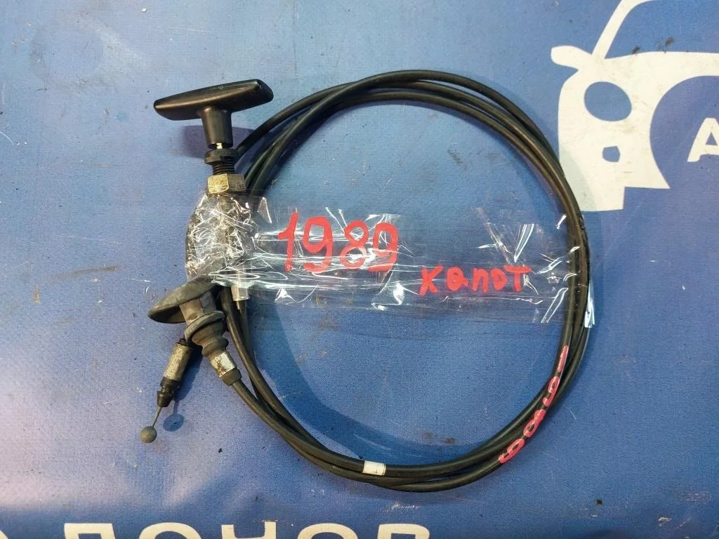 тросик замка капота MAZDA PREMACY CP8W FPDE