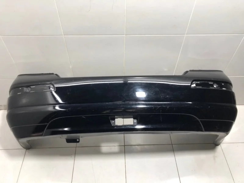 Бампер задний Nissan Tiida 1 СЕДАН