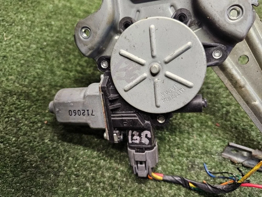 Моторчик стеклоподъемника лев Mitsubishi Lancer 10