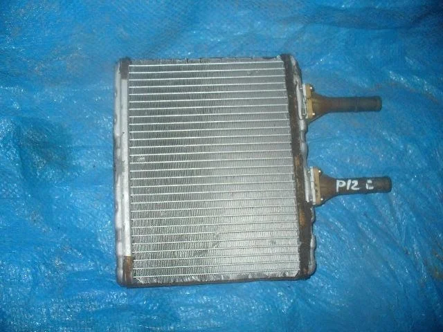 Б.у. радиатор печки NISSAN PRIMERA P12 NISSAN PRIMERA P12