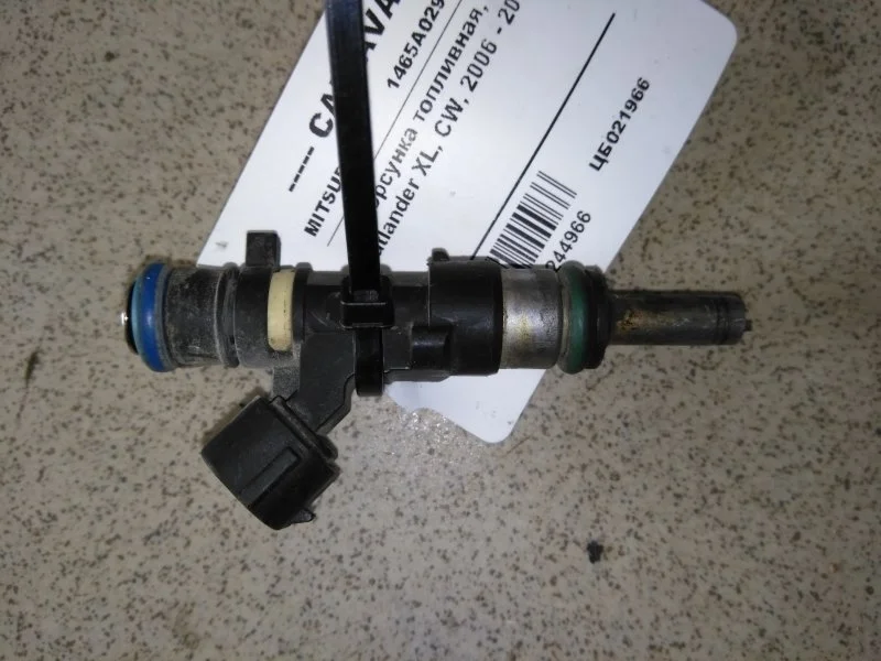 Форсунка топливная Mitsubishi Outlander Xl 2006 - 2012 1465A029 CW