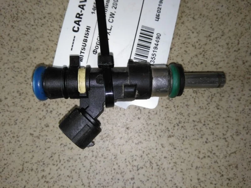 Форсунка топливная Mitsubishi Outlander Xl 2006 - 2012 1465A029 CW