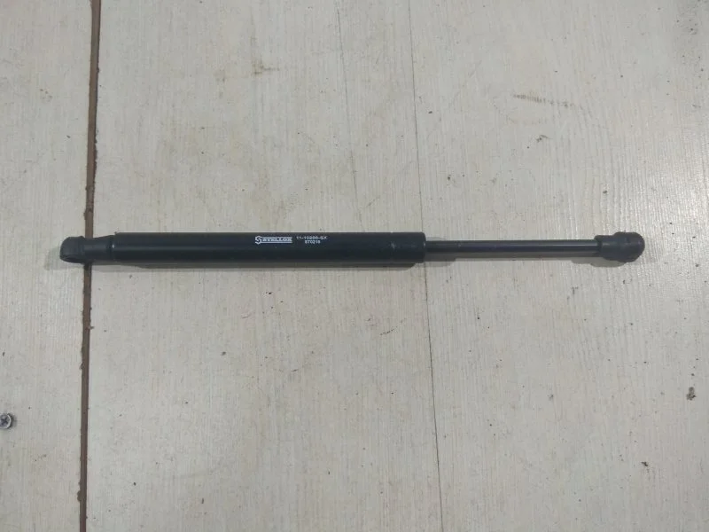 Амортизатор багажника Volkswagen Touareg 2007 - 2010 1110286SX, задний