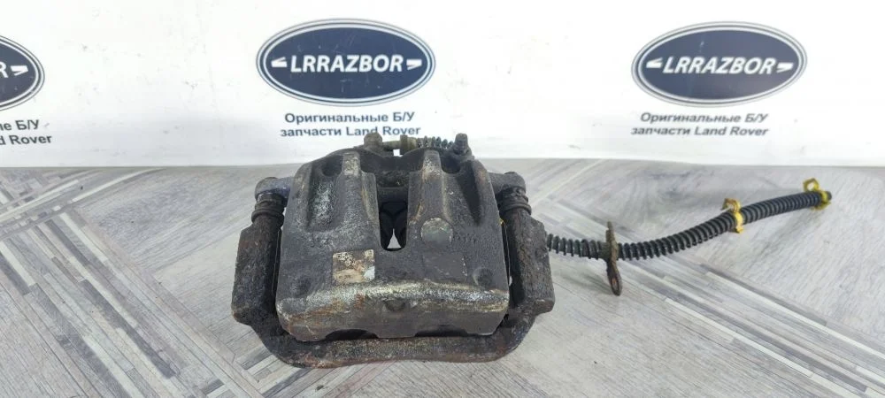 Суппорт тормозной передний правый Land Rover Discovery III (2004—2009)