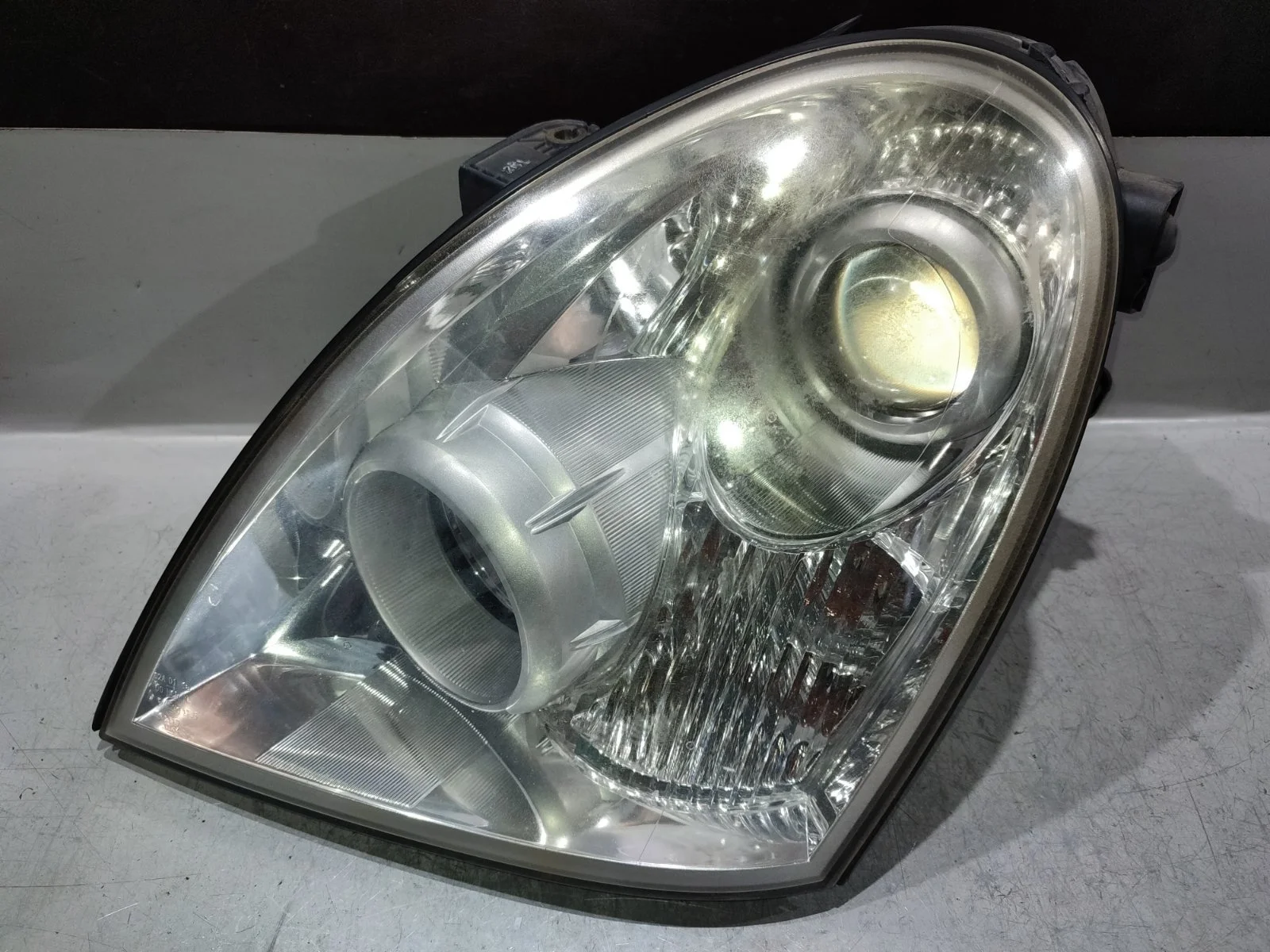 Фара SsangYong Rexton 2009 Y250