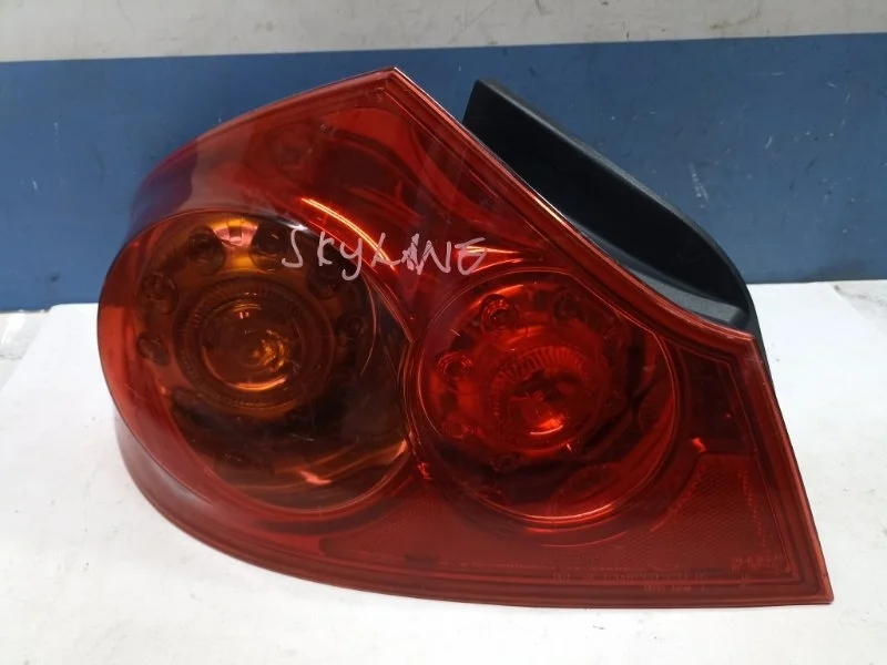 Фонарь Nissan Skyline 2007 26555JK000 PV36, задний левый