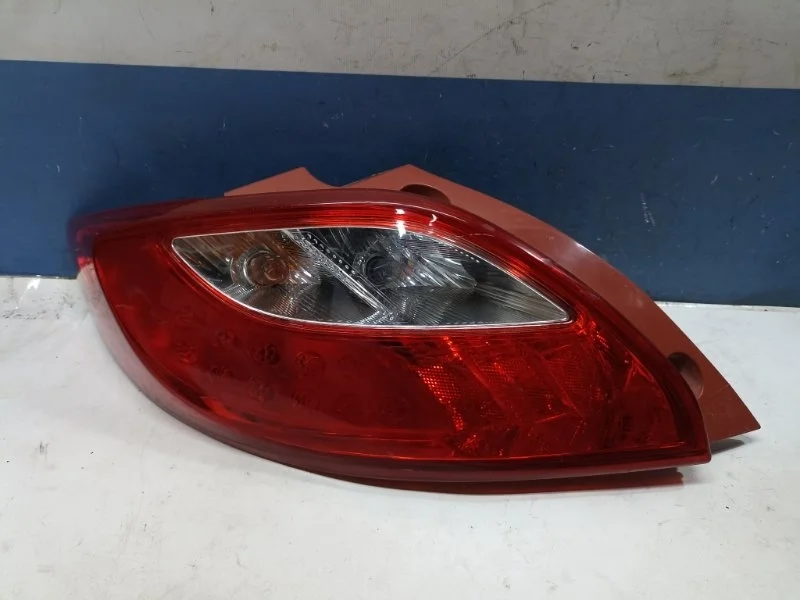 Фонарь Mazda Demio 2011 D65151160 DE, задний левый