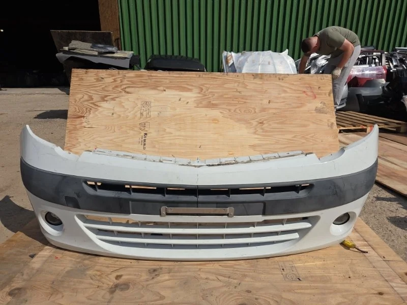 Бампер Renault Kangoo 2009 7701478153 KW, передний
