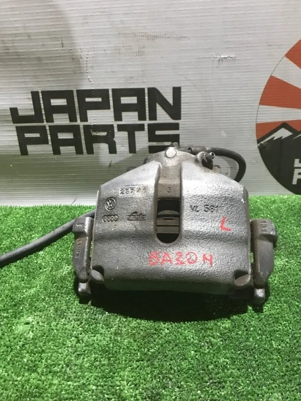 Тормозной суппорт Volkswagen Passat 1K0615124E B7, передний левый