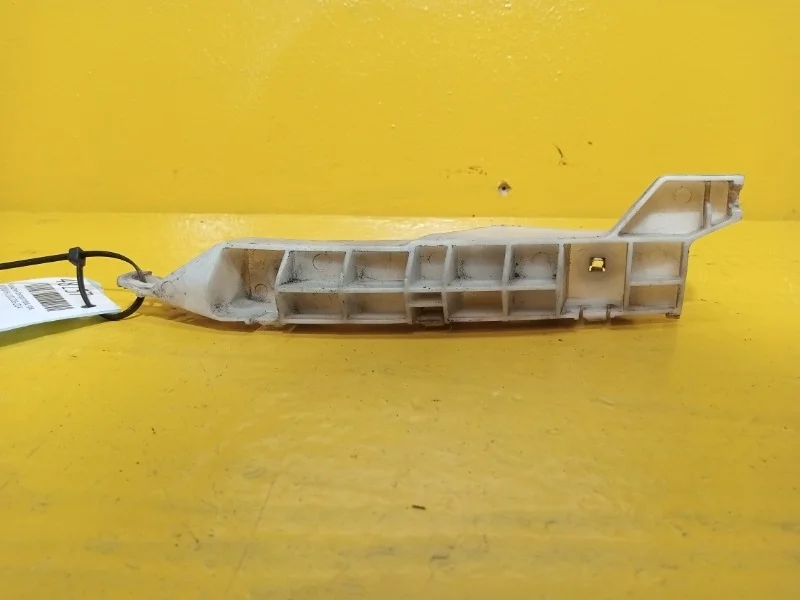 Кронштейн бампера Mitsubishi L200 2006-2014 MN146320, передний правый