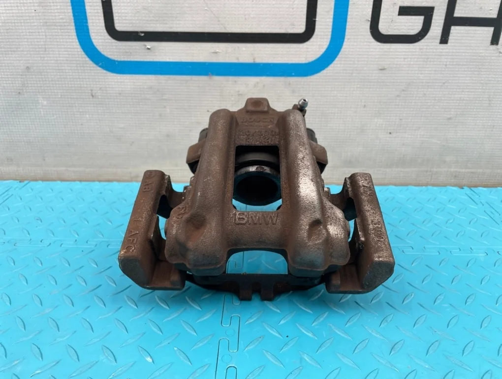 Суппорт Bmw 1-Series 2013 34216850857 F20 N13B16A 1.6, задний левый