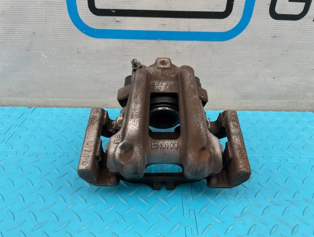 Суппорт Bmw 1-Series 2013 34216850858 F20 N13B16A 1.6, задний правый