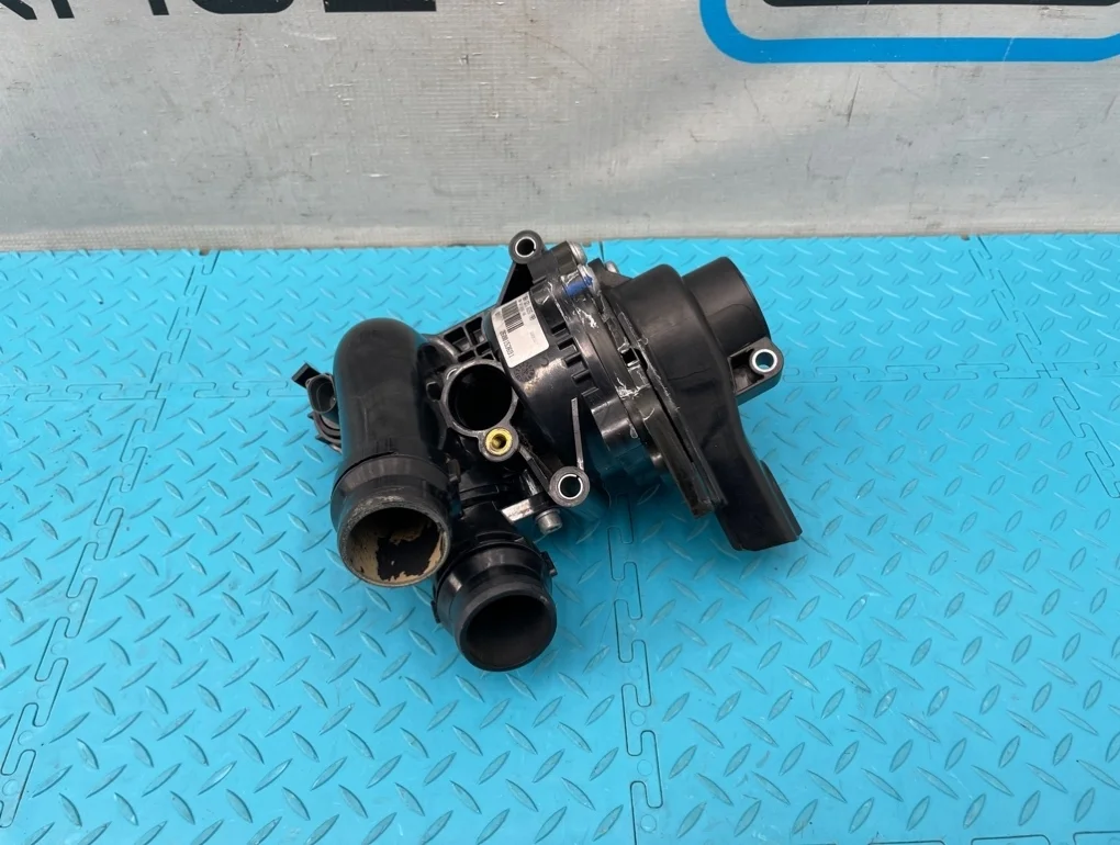 Насос водяной (помпа) Volkswagen Scirocco 2009 06H121026DR 137 CAWB 2.0