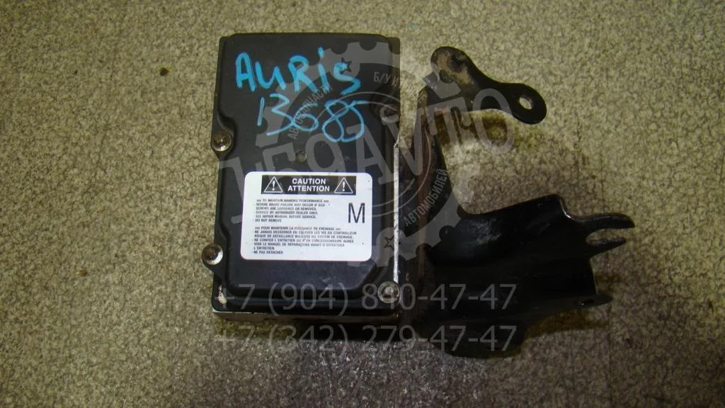 Блок abs (насос) Toyota Auris 2007 E150