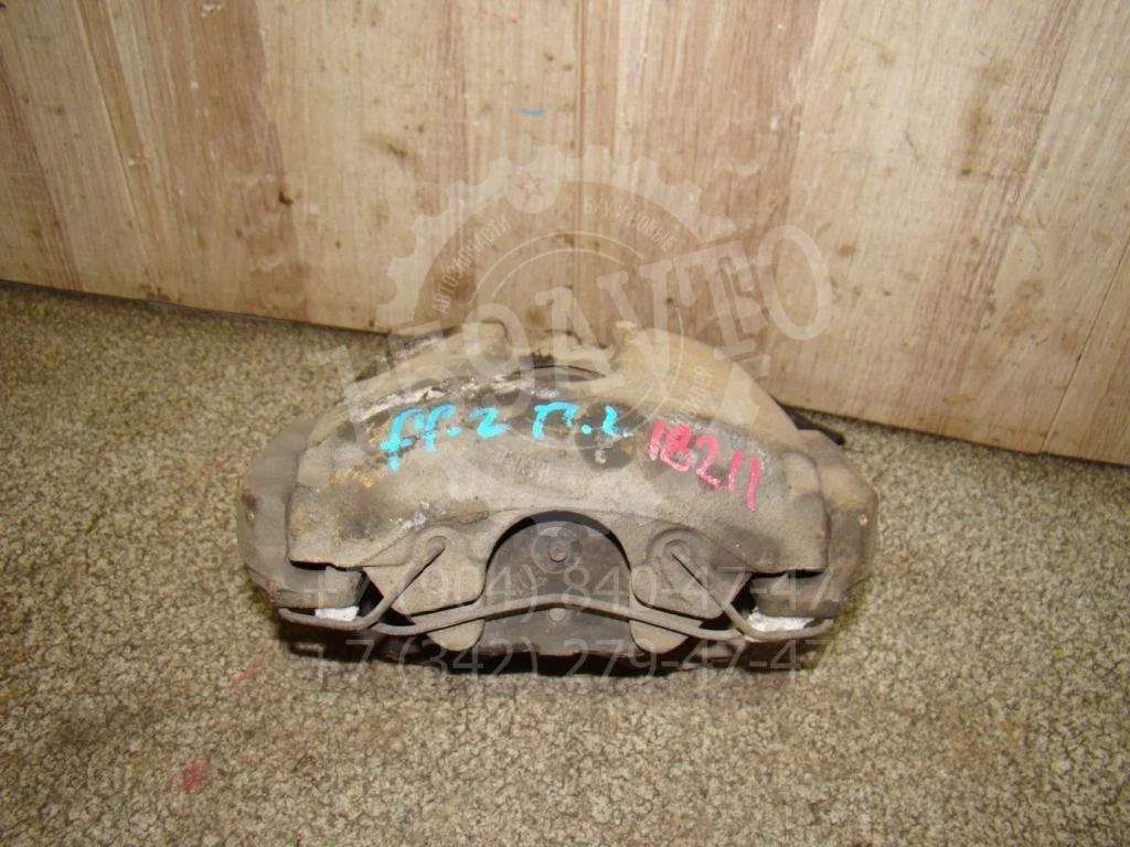 Суппорт передний левый Ford Focus 2008