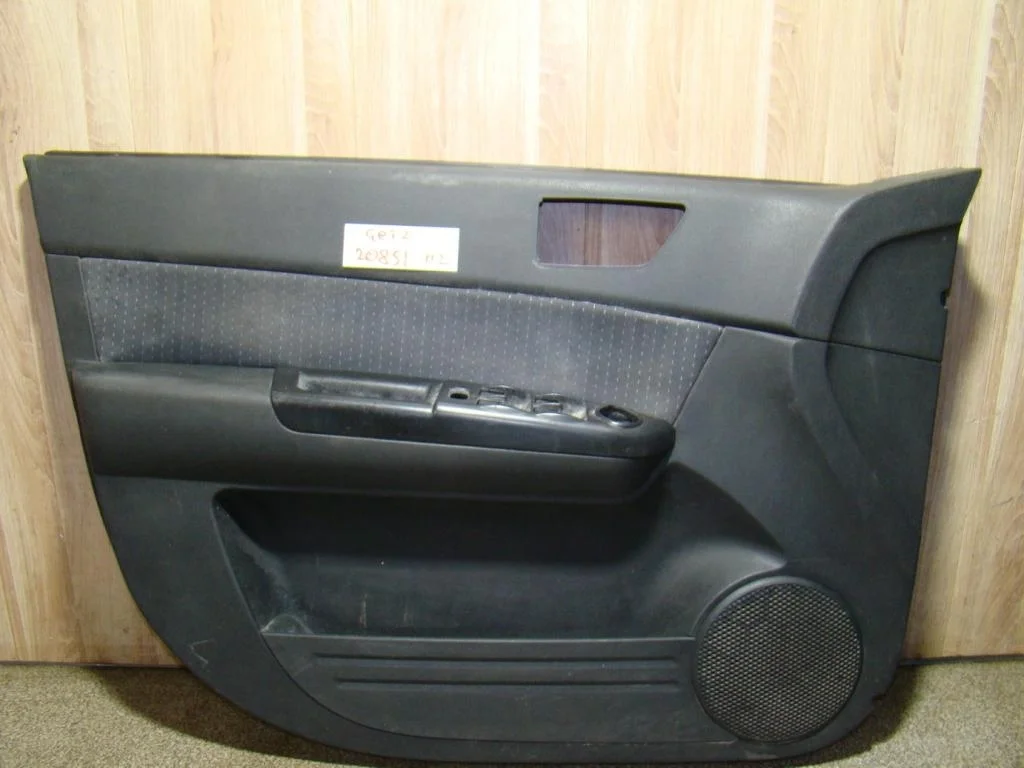 Обшивка двери передней левой Hyundai Getz