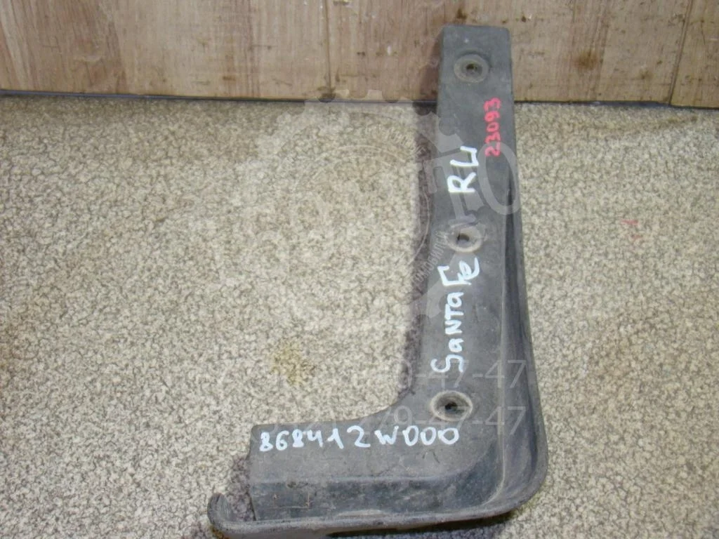 Брызговик задний левый Hyundai Santa Fe 2 CM