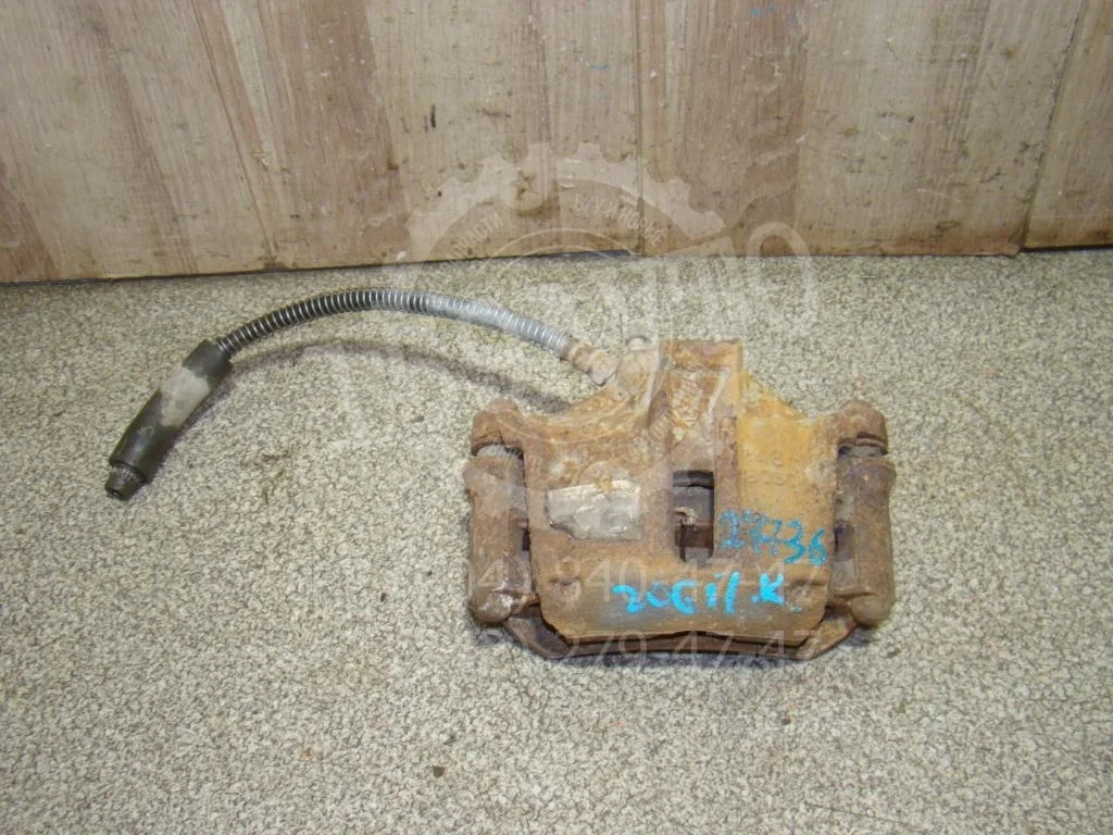 Суппорт передний правый Peugeot 206