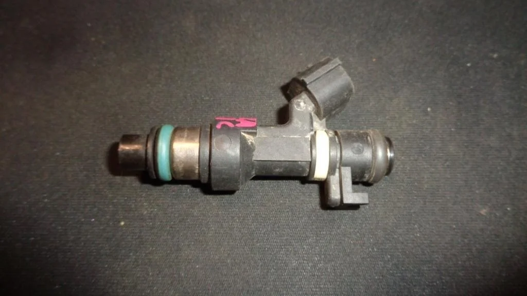 Форсунка инжекторная электрическая Nissan Almera Classic B10