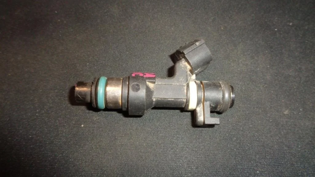 Форсунка инжекторная электрическая Nissan Almera Classic B10