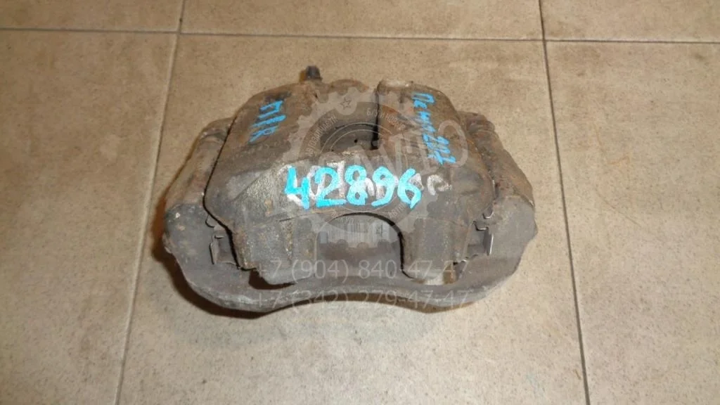 Суппорт передний правый Peugeot 207