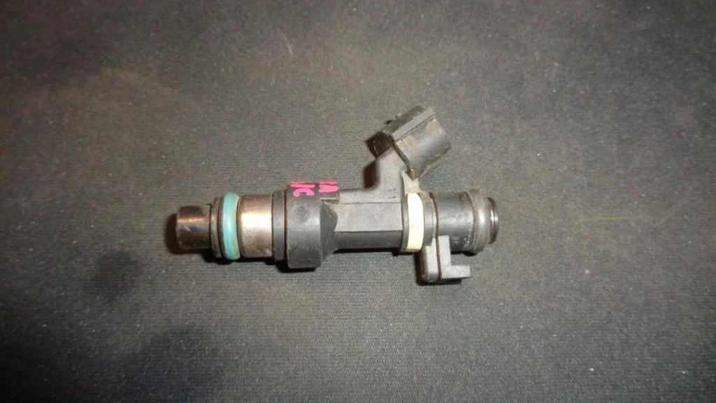 Форсунка инжекторная электрическая Nissan Almera Classic B10